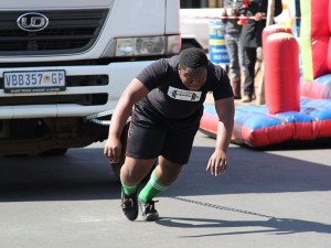 man pulls a truck