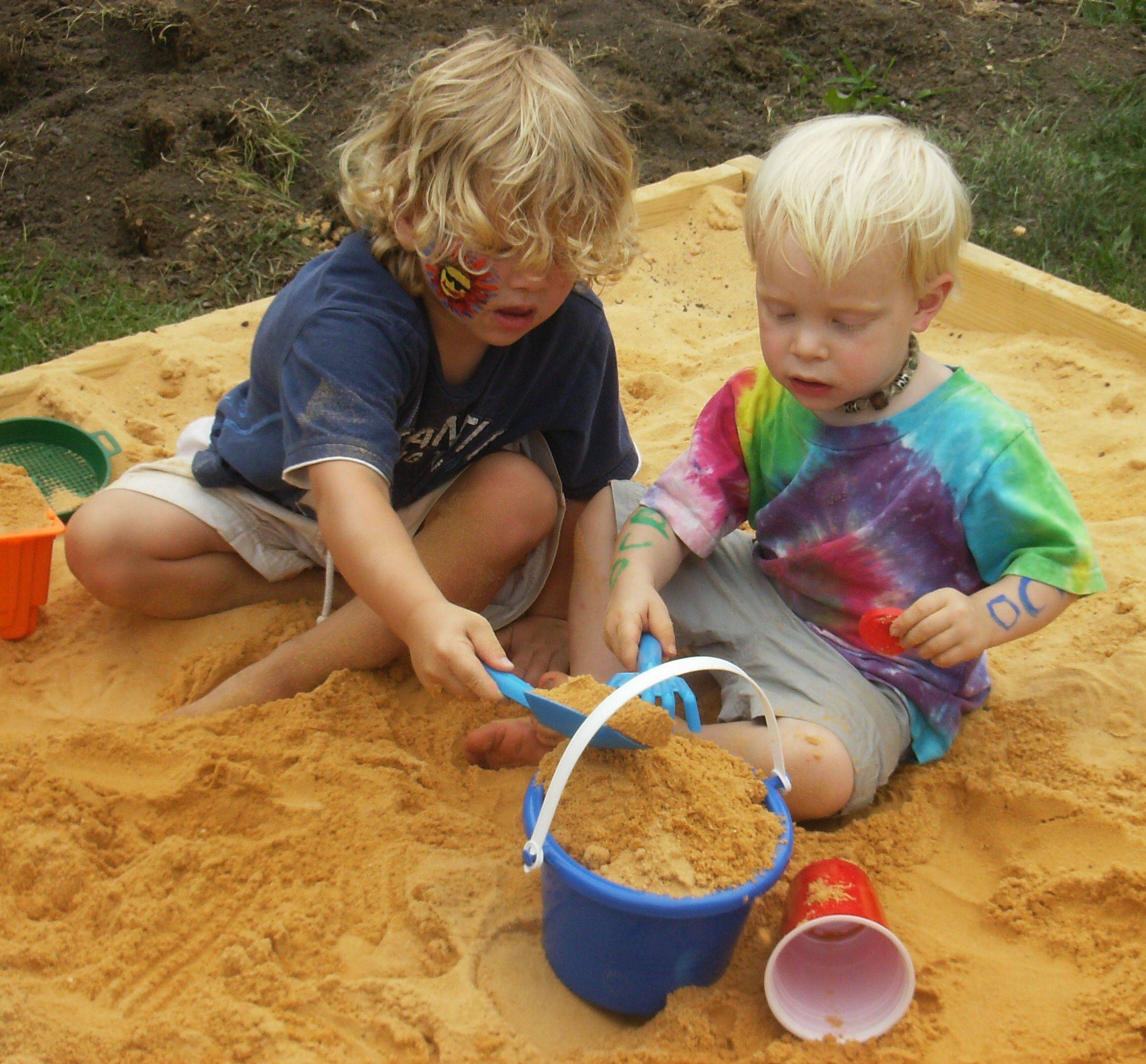 kids playing in sandbox