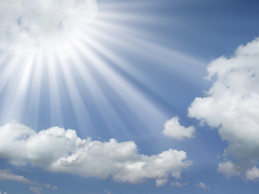 sunlight streaming through clouds