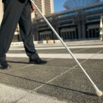 Blind person using a long white cane