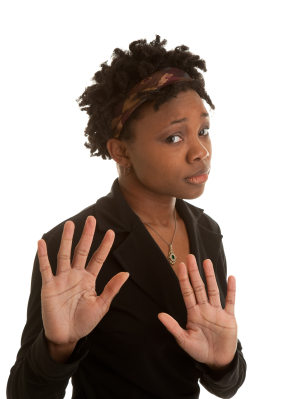 woman with her hands up protectively