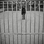 child behind bars