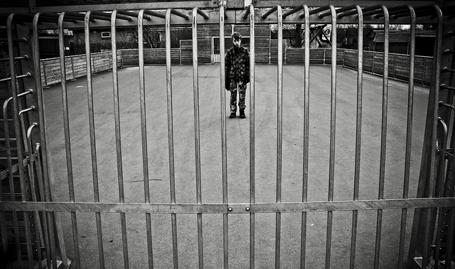 child behind bars