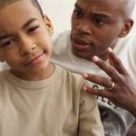 father lecturing son