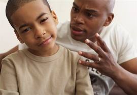 father lecturing son
