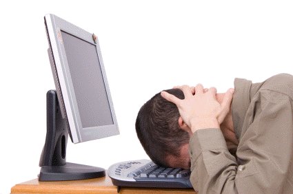 Man banging head on keyboard