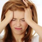 woman with stress on her face